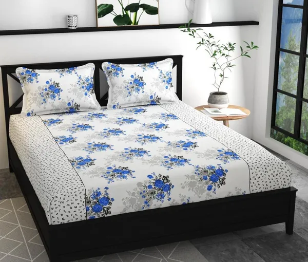 https://d1311wbk6unapo.cloudfront.net/NushopCatalogue/tr:f-webp,w-600,fo-auto/SUP-DBS-125-WHITE-BLUE FLORAL_1690184374906_n7uvqpjv3mznd3j.jpg__Bedsheet guru